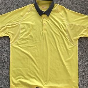 Mens Puma yellow golf shirt, size extra large.